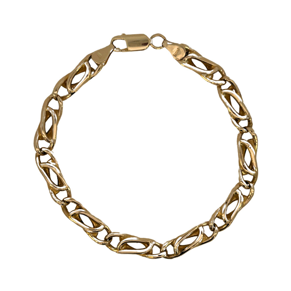 Flat view of a 14k yellow gold Figaro link bracelet with open patterned links and a lobster clasp, 8 inches long.