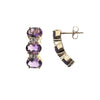 Curved 14k gold amethyst and diamond half-hoop earrings with post backs.