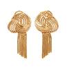 18K gold woven collar necklace with knotted gold wire and fringe detail, paired with clip-on fringe earrings. Earrings Only