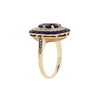 Blue sapphire ring with European-cut diamonds, cobalt enamel frame, platinum, and 14K gold accents. Side view.