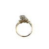 Side profile showing platinum top, pearl, and diamond setting of Edwardian ring.