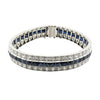 Art Deco platinum bracelet with channel set French cut synthetic sapphires and diamond borders