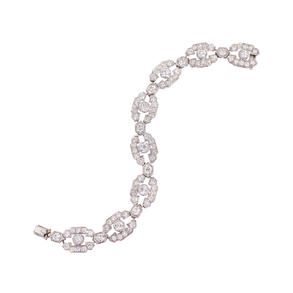Vintage Art Deco platinum diamond bracelet with geometric links and old European cut diamonds