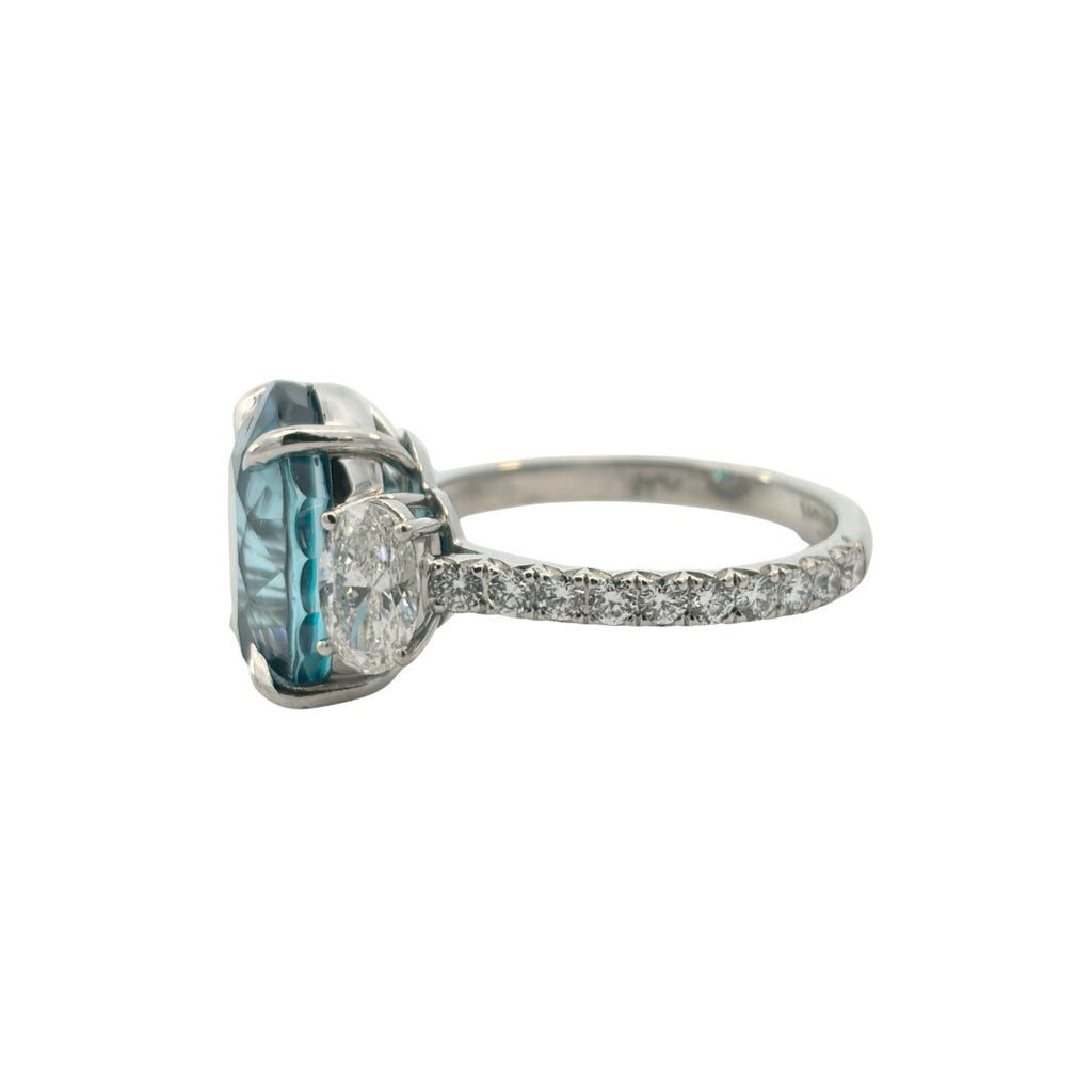 blue zircon ring side profile platinum diamond band