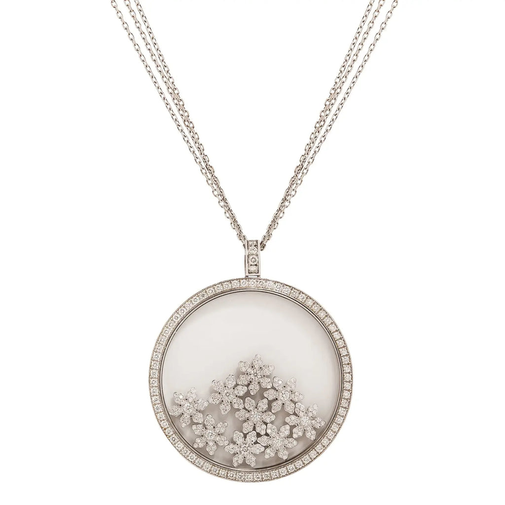 Chopard Happy Diamonds necklace, 18K white gold, 42mm disc with moving diamond snowflakes, 24-inch chain.