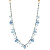  Elegant Clare Ullman necklace with faceted blue topaz, apatite, and tanzanite briolettes. 18K gold stylized clasp.