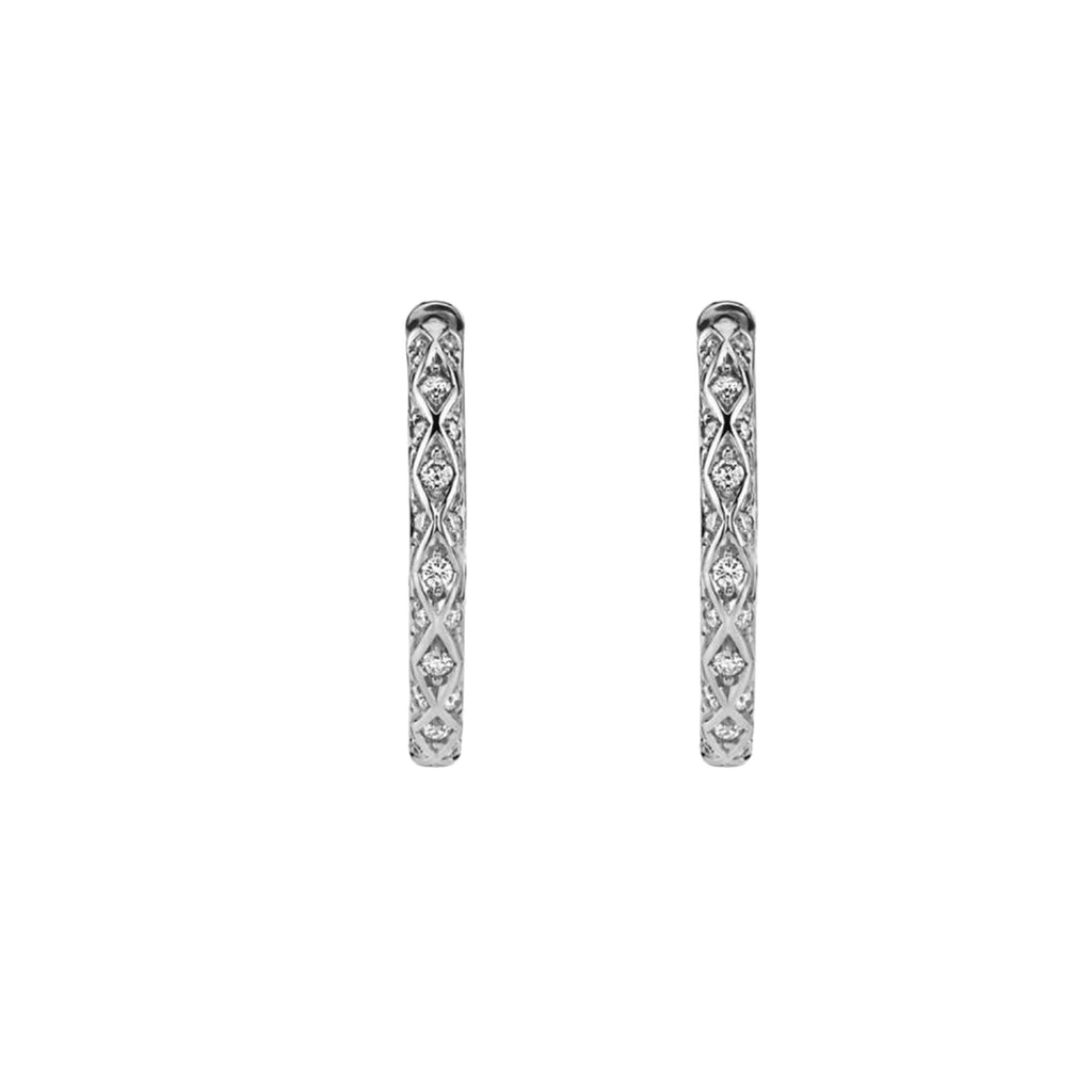 Front view of Harry Kotlar white gold hoop earrings with round diamonds framed by repeating intersecting gold lines.