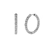 Harry Kotlar white gold diamond hoop earrings shown from the front and at an angle, highlighting the criss cross pattern.