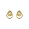 Artistic close-up of Marco Bicego Triple Loop Earrings in hand-engraved 18k yellow gold