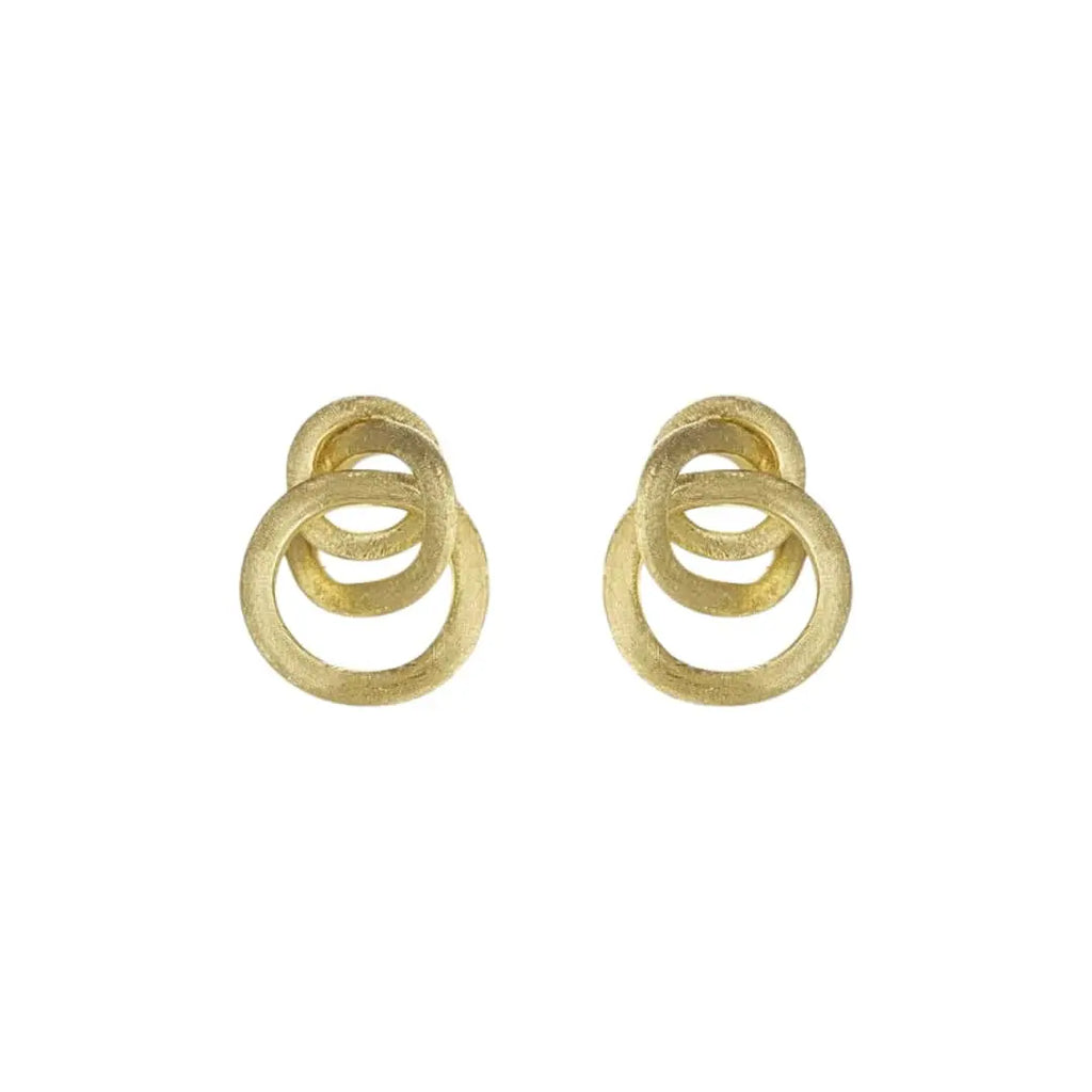 Artistic close-up of Marco Bicego Triple Loop Earrings in hand-engraved 18k yellow gold
