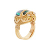 18K gold Egyptian Revival scarab ring by Opex with black opal inlay, bezel-set diamonds, and ribbed tapered shank. Side view