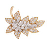 Vintage floral diamond brooch in yellow gold by Oscar Heyman