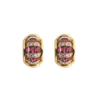Front view of Oscar Heyman vintage yellow gold earclips featuring channel-set baguette rubies and round brilliant diamond accents in a sculptural half hoop design.
