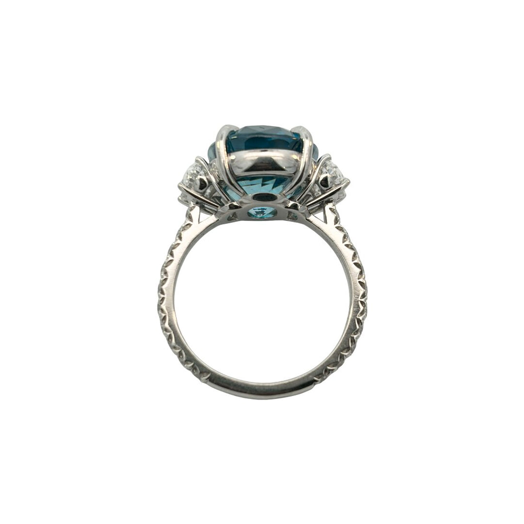 blue zircon ring front view oval center diamond sides