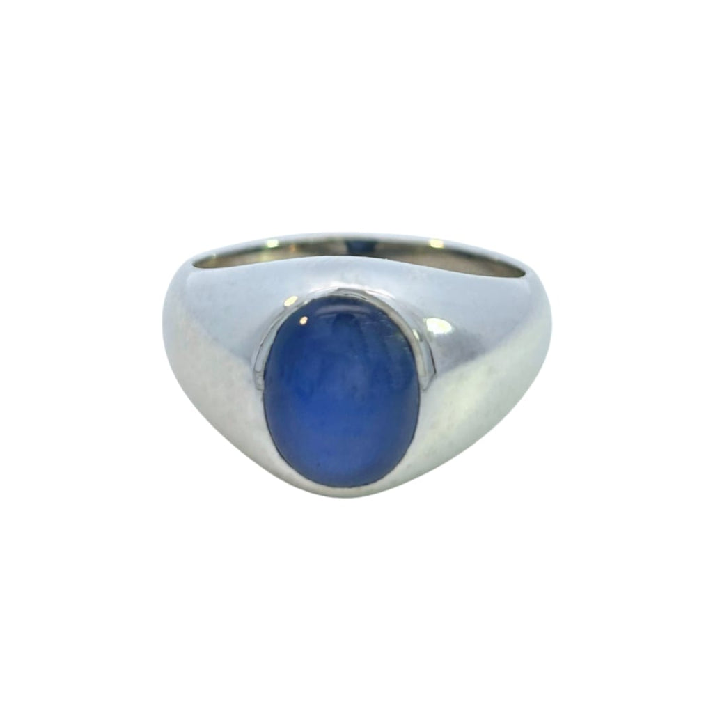 Platinum ring with oval blue star sapphire cabochon front view