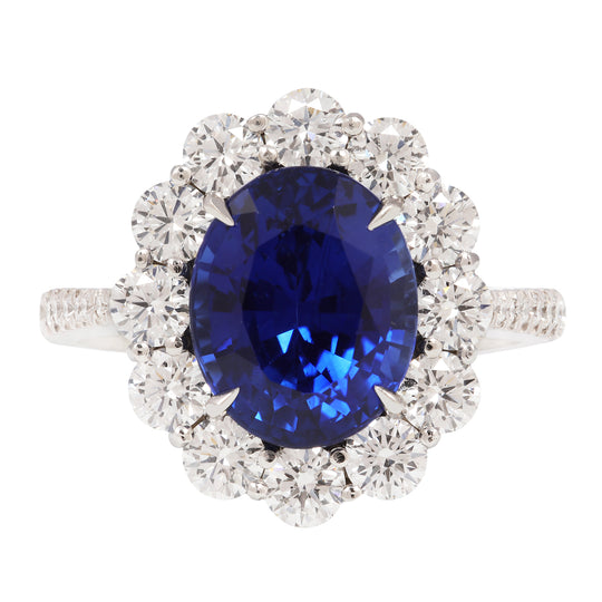 Large Oval Sapphire and Diamond Halo Ring