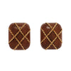 Collectible Seaman Schepps clip-on earrings in carved Rosewood with 18K gold twisted wire cage design.
