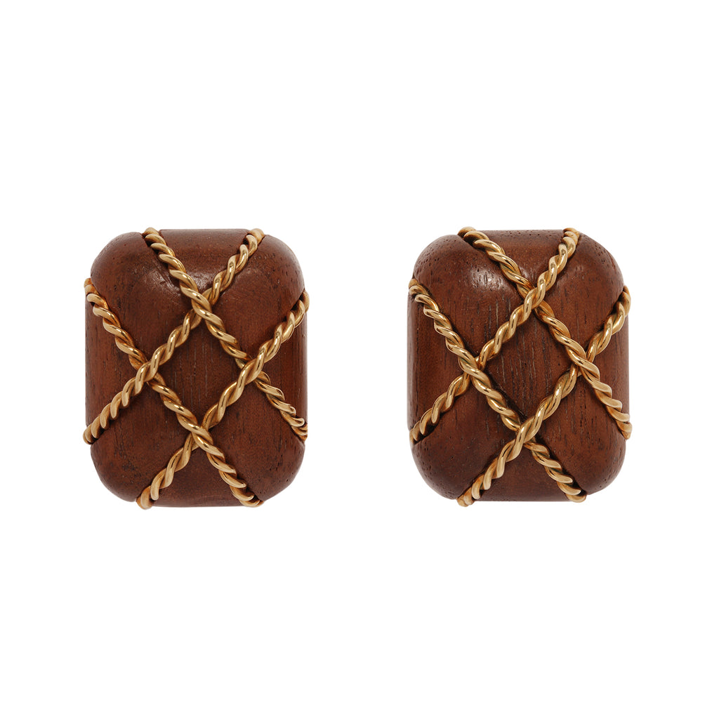 Collectible Seaman Schepps clip-on earrings in carved Rosewood with 18K gold twisted wire cage design.
