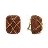 Collectible Seaman Schepps clip-on earrings in carved Rosewood with 18K gold twisted wire cage design. 