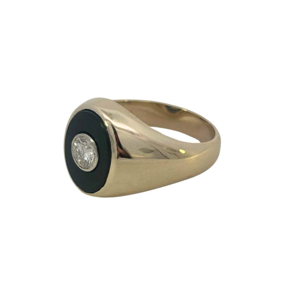 Side view of gold and onyx men's ring showing sculpted band