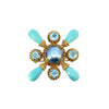 Stephen Dweck gold brooch with a gray mabé pearl center, four round blue topaz gemstones and four faceted turquoise briolettes.