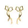 Pair of Tiffany & Co. gold bow drop earrings with open loops and long, curling ribbon ends.