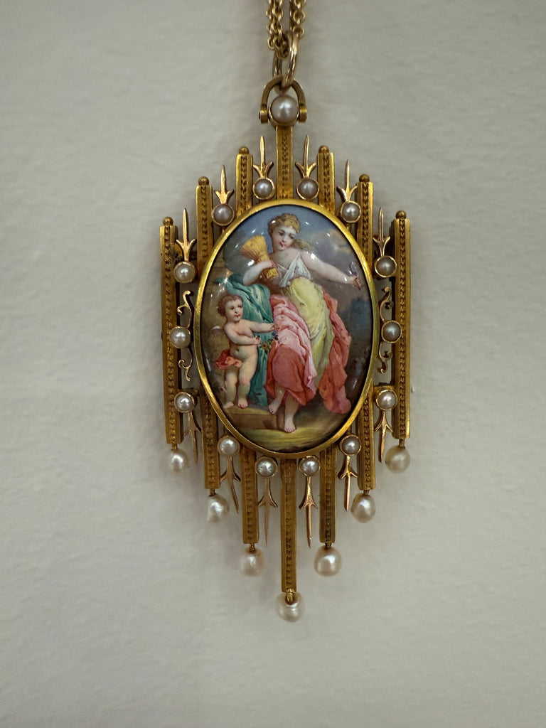 Close-up of hand-painted porcelain miniature of Demeter set in 18K gold with seed pearls on chain