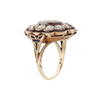 Victorian ring with bezel set ruby, bezel-set diamond clustered around the center stone and blue enamel around the border. Side View show enameling and engraving. 