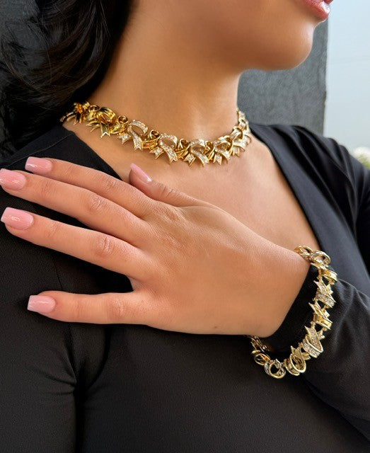 Vintage Tiffany & Co. Ribbons diamond necklace in 18K yellow gold and platinum worn on model