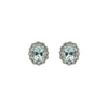 14k white gold earrings with oval aquamarines surrounded by diamond halos and milgrain detail