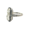 Platinum Art Deco double diamond and sapphire halo dinner ring showing engraved shoulders and milgrain detail