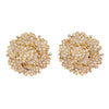 Front view of estate Buccellati clip-on earrings featuring 18k yellow gold oak leaf clusters with round brilliant diamonds and white gold accents.