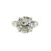 Platinum ring with a 4.95ct European–cut diamond flanked by bullet-shaped side diamonds