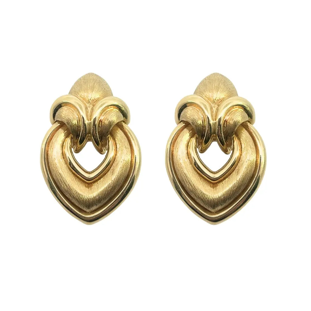 Pair of Henry Dunay 18k yellow gold doorknocker earrings with textured Sabi finish, inspired by Japanese wabi-sabi aesthetics.