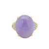 Front view of a vintage Gump’s 18k yellow gold ring with a GIA-certified lavender jade cabochon and pavé diamond accents.