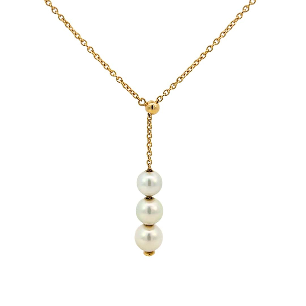 Front view of a Mikimoto Y-style necklace with three Akoya pearls on a delicate 18k yellow gold chain.