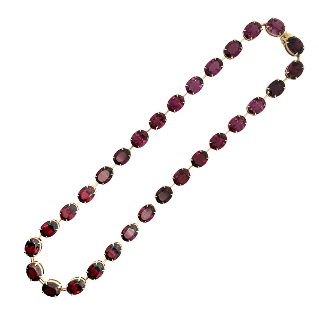 Victorian-inspired bar-set necklace with thirty oval rhodolite garnets in 14k yellow gold.
