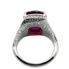 18k white gold rubellite and diamond cocktail ring with black diamond swirl accents and 5.35ct cushion-cut rubellite center. Side view.