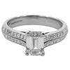 Tiffany & Co. emerald cut diamond engagement ring in platinum with a 1.14ct G/ VVS2 center diamond and channel-set square cut diamond shoulders.