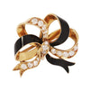 Front of Tiffany bow brooch showing diamonds and enamel.