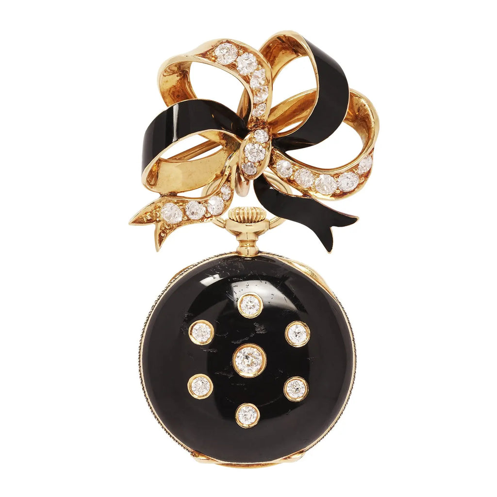 Convertible Tiffany & Co. black‑enamel lapel watch suspended from a diamond‑set gold bow brooch.