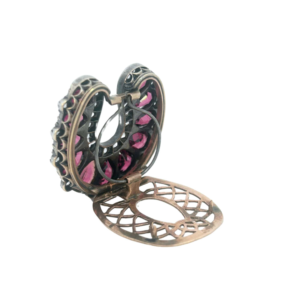 Detail angle of the clasp and gemstone arrangement on the Victorian horseshoe clip.