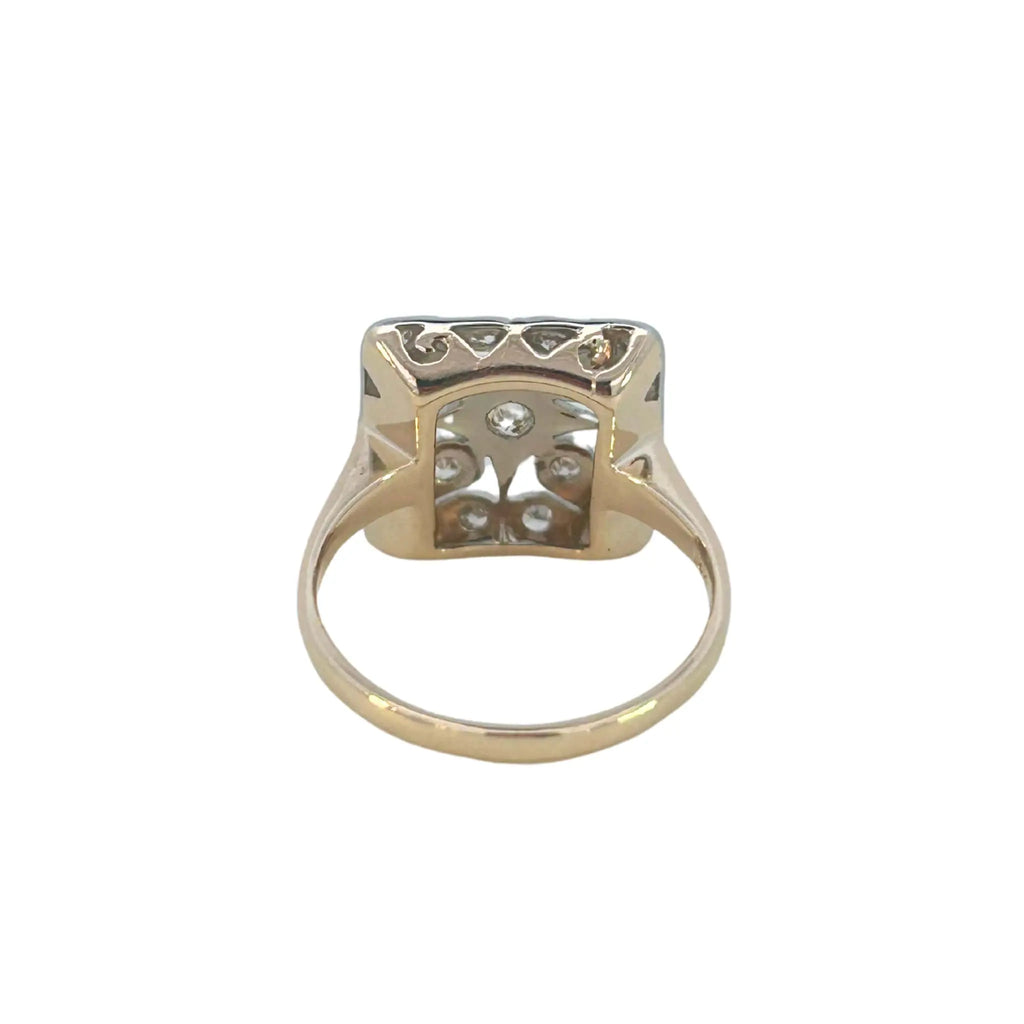 Back view of the ring showing open gallery work and solid yellow gold shank.