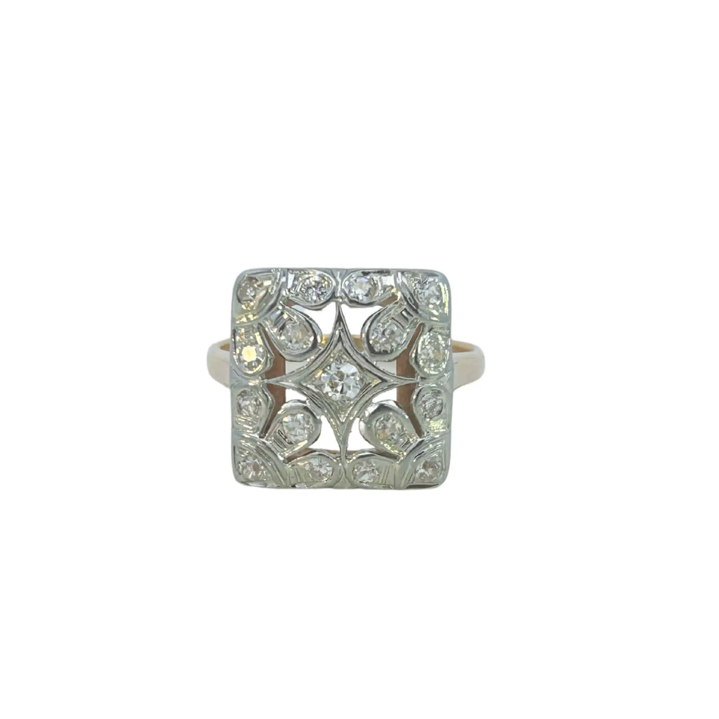 Front view of a vintage two-tone ring featuring a square diamond-set top and yellow gold base.
