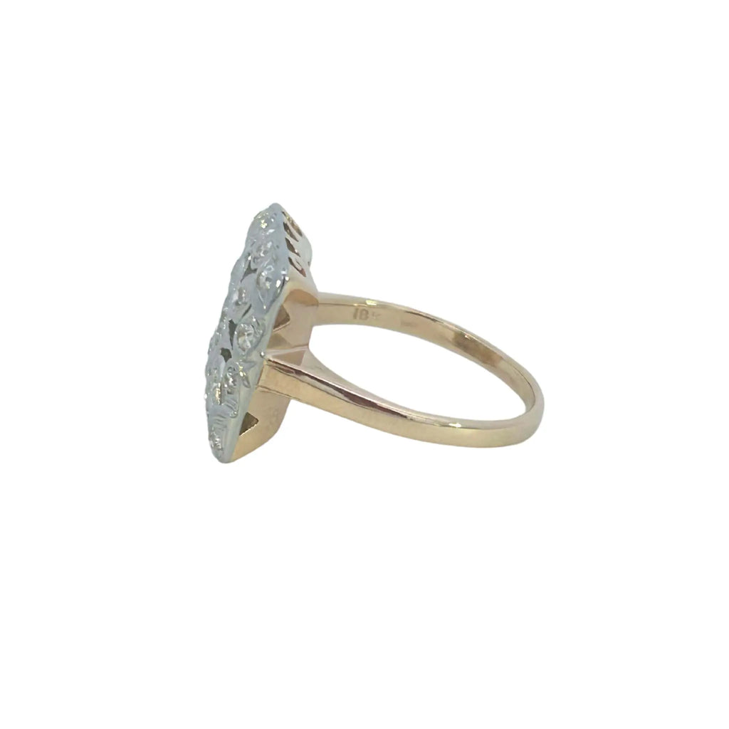 Side profile of the ring showing the raised square top and contrast between the white and gold metals.