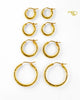 Elizabeth Locke hammered gold hoop earrings shown in various sizes for interchangeable earring pendants