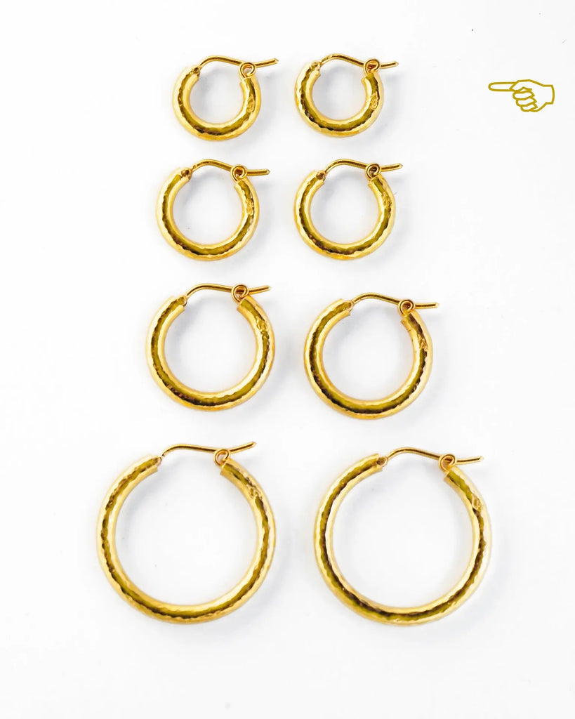 Elizabeth Locke hammered gold hoop earrings shown in various sizes for interchangeable earring pendants