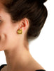 Gold bee and diamond earring in 19k yellow gold shown worn on ear