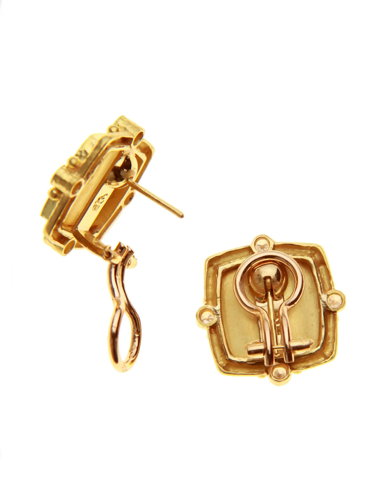 Gold bee and diamond earrings with omega backs and fold-down posts, back view