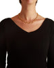 Hammered gold diamond Celtic link necklace shown worn at 17.0 inches